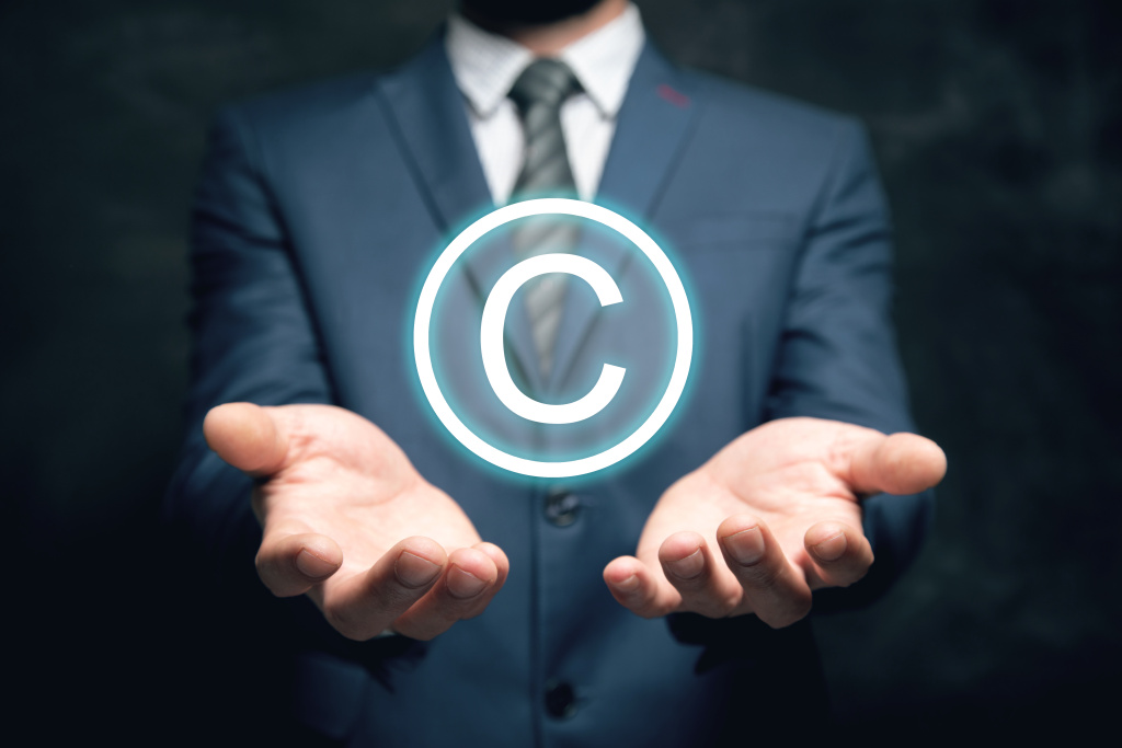 intellectual-property-icon-man-holding-in-his-hands.jpg